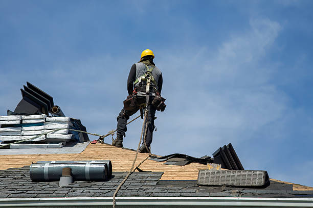 Professional Roof Replacement technician working in Munson, PA